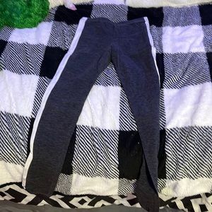 Cute gray leggings with white stripes down the side